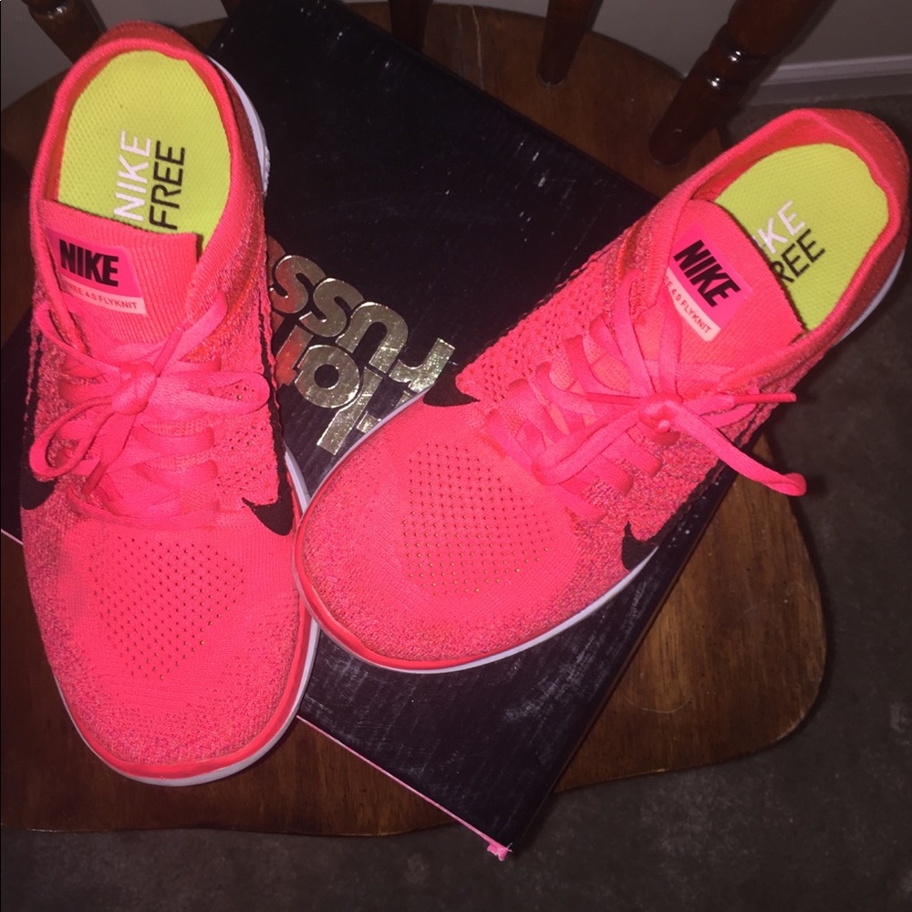 Neon Nike Free running shoes